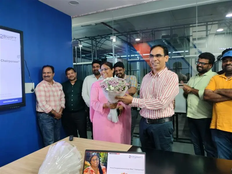 Celebration with flowers and applause.